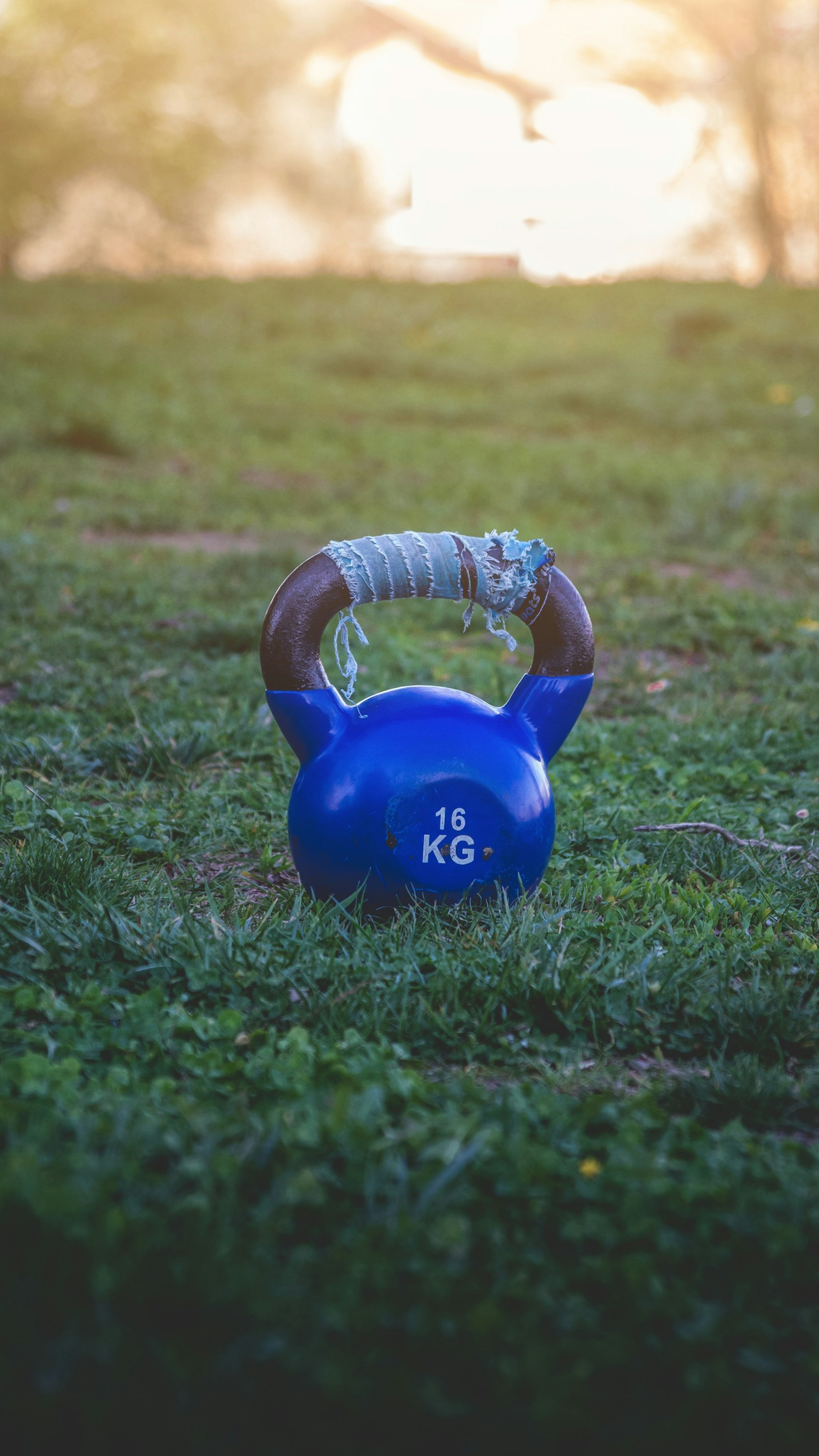 Kettlebell on grass before an outdoor session